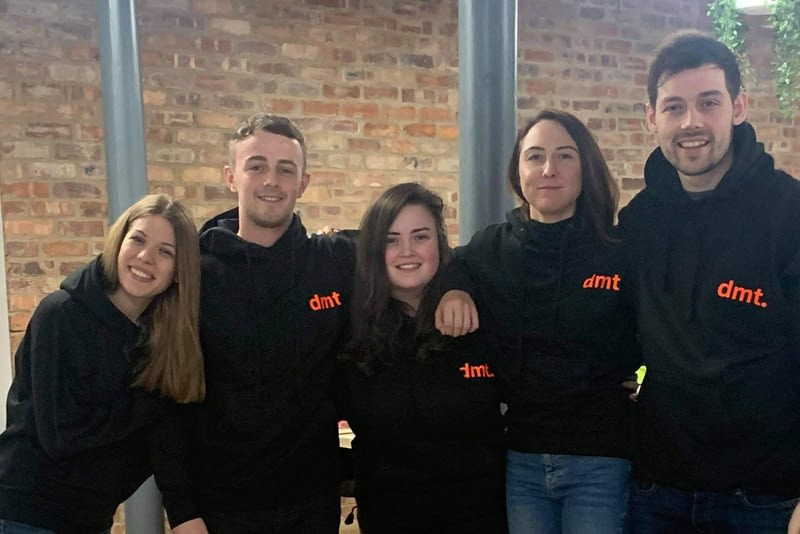 digital media team in branded hoodies